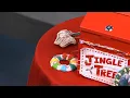 Mike Marshall unwraps personalized ornaments from Jude s Jingle Tree