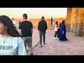 Lagu Walking by Castelo Real de Mogado at sunset in Essaouira, Morocco