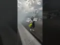 American Airlines passengers exit plane via emergency slide after aborted takeoff in Denver