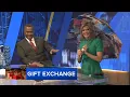 Cecily Tynan and Rick Williams exchange gifts on Action News at 11