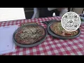 Dean makes pizza on the grill