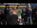 Ebanie Bridges MAKES EDDIE HEARN UNCOMFORTABLE AT WEIGH IN GIFTS HIM SUNGLASSES