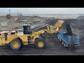 Caterpillar 992G Wheel Loader Loading Coal On Trucks With One Pass - Mining