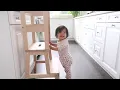 Baby using learning tower