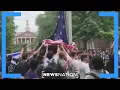 American flag protected by UNC fraternity brothers On Balance