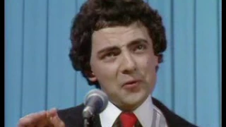 IMMIGRATION - Rowan Atkinson