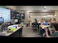 Jeremy Lewan reads to students in Luzerne County
