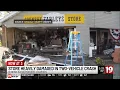 2 cars including Geauga County Sheriff s cruiser slam into local business