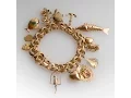 ESTATE 14K YELLOW GOLD VINTAGE CHARM BRACELET