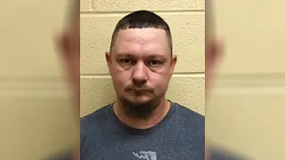 Former corrections officer charged with bringing drugs phones into Hancock County jail