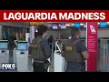 LaGuardia Airport TSA wait times ICE officers at checkpoints