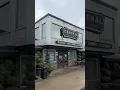 shows confrontation between apparent ICE agents and restaurant manager