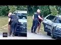 Cop Allegedly Caught Kissing Getting in Backseat of Patrol Car with Woman Now Under Investigation