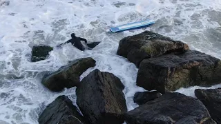 Surfer gets swept into Jetty Long Beach NY