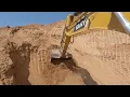 SANY Excavator loading soil on trucks