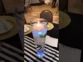 Repass or home going celebration set up idea Floating centerpieces and Tuxedo backdrop