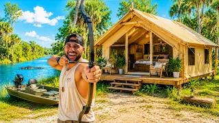 24hrs in Amazon's LARGEST Inflatable Tent!! (swamp challenge)