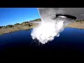 Watch trout get dumped from a plane into a remote high-mountain Utah lake