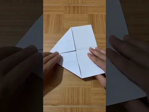 How to fold a children's paper airplane to show it flying in a circle back and forth #shorts
