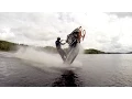 Snowmobile wheelies on water