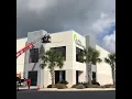 No Job s Too Big Architectural Sign Installation on Building Face