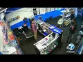 shows wild shootout with guard at Compton smoke shop that led to robbery suspect s death
