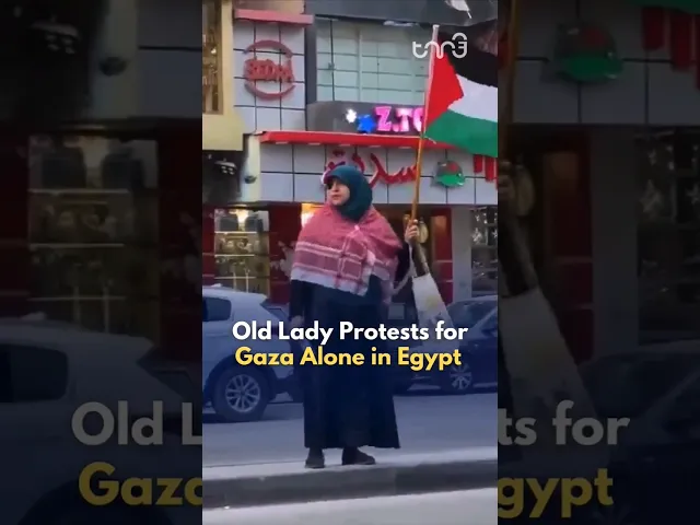 ⁣An Egyptian woman stands alone protesting for Gaza in the middle of Cairo City #news #Cairo #egypt