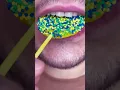 Lemon lollipop bold bite with a golden grin
