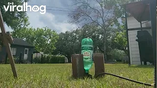 Turning a Soda Bottle Into a Water-Powered Rocket With a Bike Pump || ViralHog