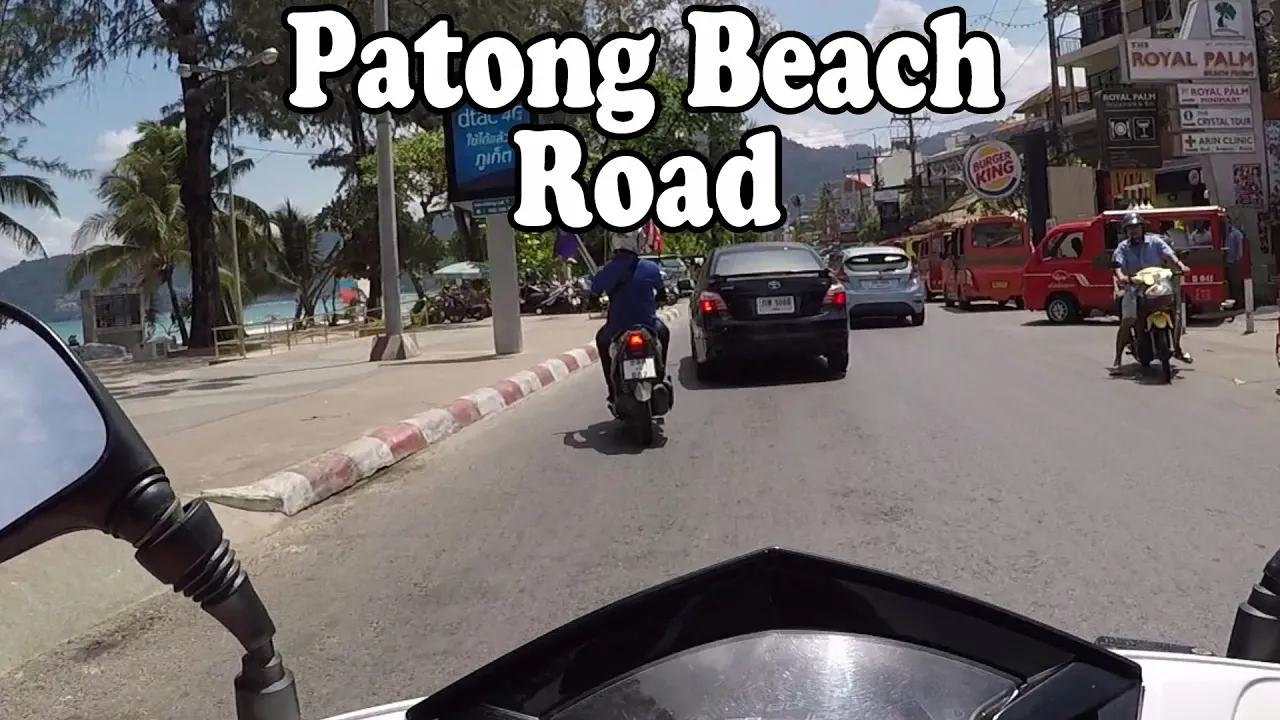 Patong Beach Road. Patong Phuket Thailand on a motor scooter