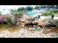 Lagu Completed Project Pushing Rock to small area for remove deep water  and dirty garbage  by Bulldozer