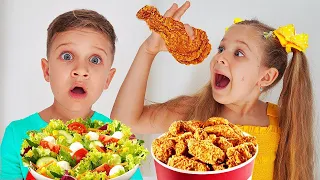 ديانا وروما يتظاهران بلعب المدرسة وتناول طعام غير صحي دندنها