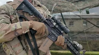 US Army Sergeant First Class E-7 Demonstrates a Function Check on a M4 Carbine Assault Rifle