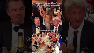 Sean Penn smokes right at the table at the Golden Globes