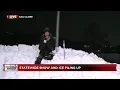 Blowing drifting snow making for whiteout road conditions in Eau Claire
