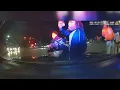 DASHCAM Street takeover in Cleveland shows people jumping on police officer s hood of car