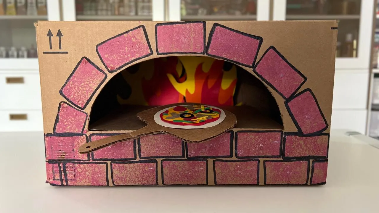 Teach Kids About Sustainability By DIYing a Cardboard Brick Pizza Oven