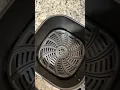 Insert the Gourmia 7 quart digital air fryer crisper tray into the basket
