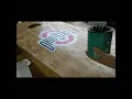Applying polyacrylic finish to a cornhole board