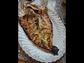 Butterflying and grilled whole European Sea Bas aka brazino aka lavraki
