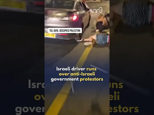 ⁣An Israeli driver runs over anti-government protestors in Tel Aviv.