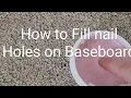 filling nail holes in baseboard