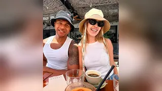 Katie Piper showcases her jaw-dropping abs in a tiny bikini while drinking beer swimming in the