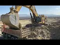 Download Lagu Caterpillar 6015B Excavator Loads Hard Rock \u0026 Soil On Trucks | Mining for Ore - Sotiriadis Mining