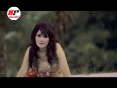 Download MP3 Tersisih -  Rita Sugiarto Lirik (Official Video)