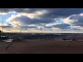 Lake Michigan waves crash along Holland pier