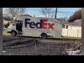 Delivery gone wrong FedEx truck driver goes through West Seneca homeowner s yard