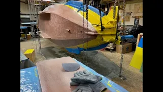 Polishing the copper coat.