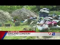 Trash dirt found covering gravestones at Oakland Cemetery in Cranston