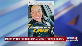 Moore police officer facing embezzlement charges